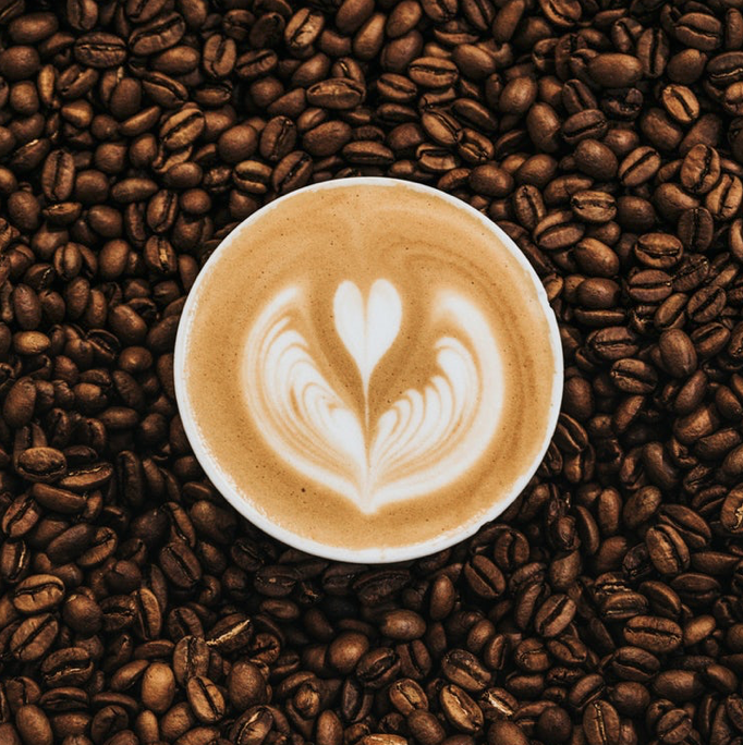 Coffee cup and beans