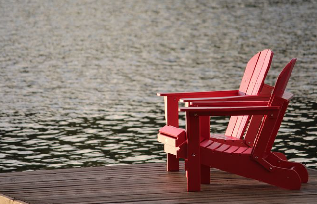 Chairs by water